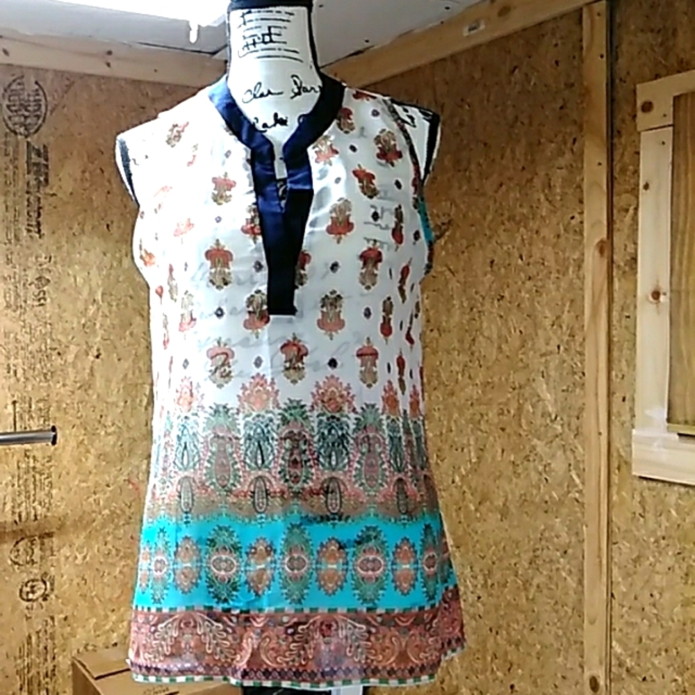 Ezra sheer beautiful sleeveless blouse.